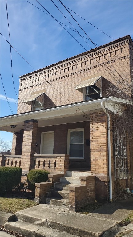 view of front facade featuring covered porch