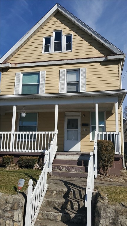 view of front of property featuring covered porch