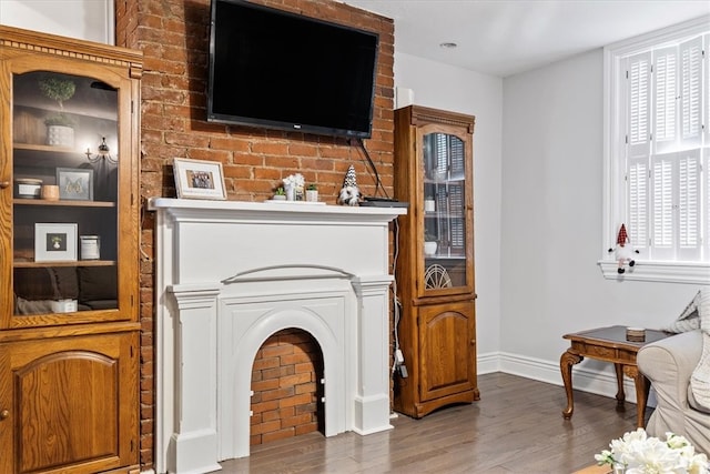 living room featuring dark wood-type flooring