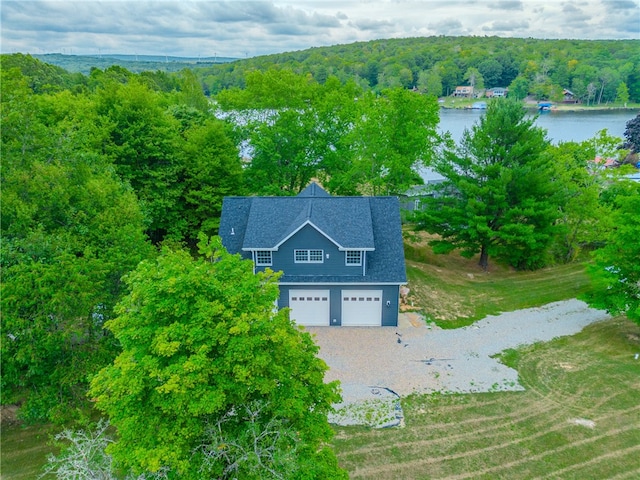 birds eye view of property featuring a water view