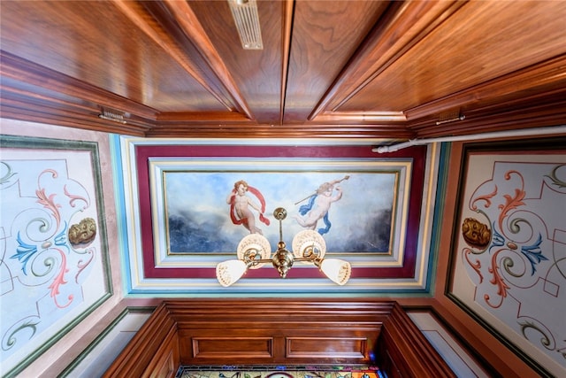 interior details with ornamental molding and wooden ceiling