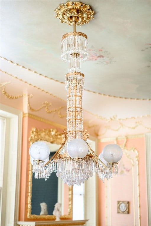 interior details featuring a notable chandelier