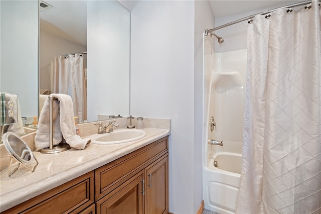 bathroom featuring shower / tub combo with curtain and vanity