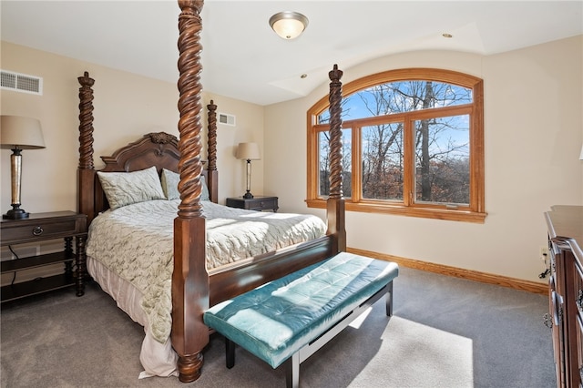 carpeted bedroom featuring lofted ceiling