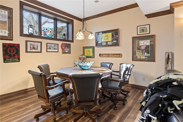 dining room featuring crown molding and dark wood-type flooring