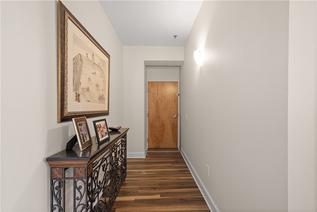 hallway featuring dark wood-type flooring