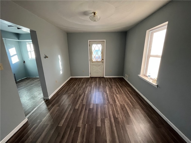 spare room featuring dark hardwood / wood-style floors