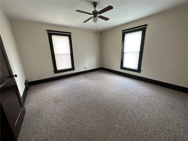 unfurnished room featuring carpet and ceiling fan