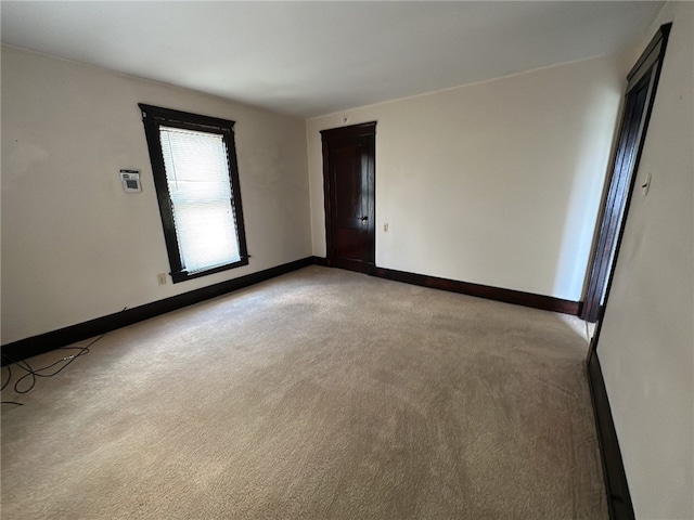 empty room with light carpet