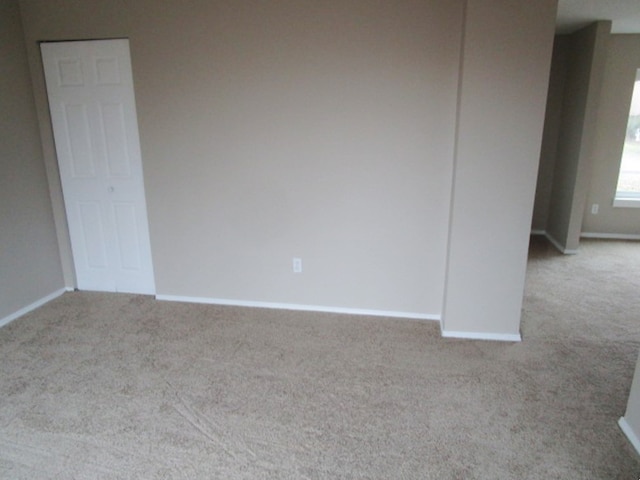 empty room with light carpet