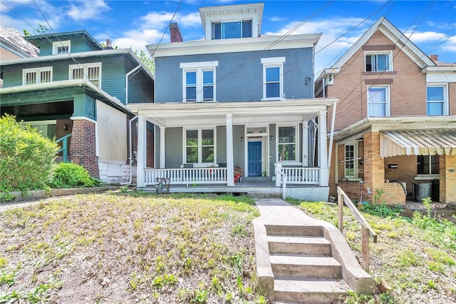 view of front facade featuring covered porch