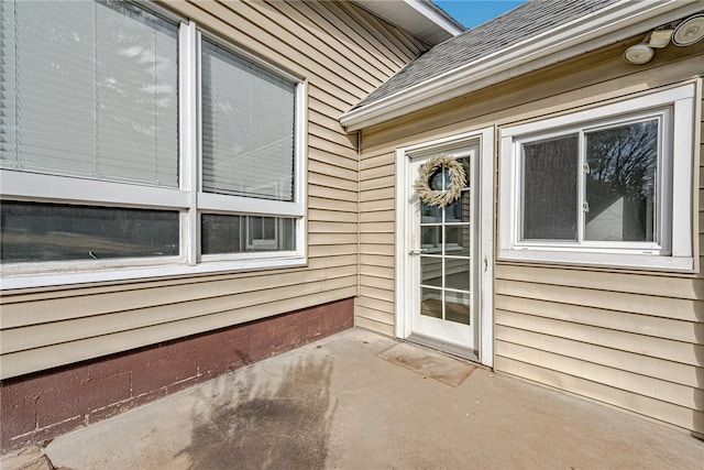 view of side of property featuring a patio