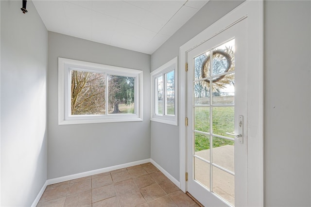 entryway featuring light tile floors