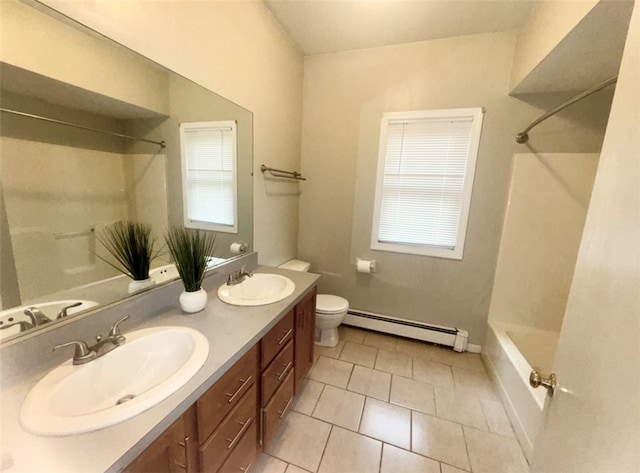 full bathroom with a baseboard heating unit, tile patterned floors, toilet, vanity, and bathtub / shower combination