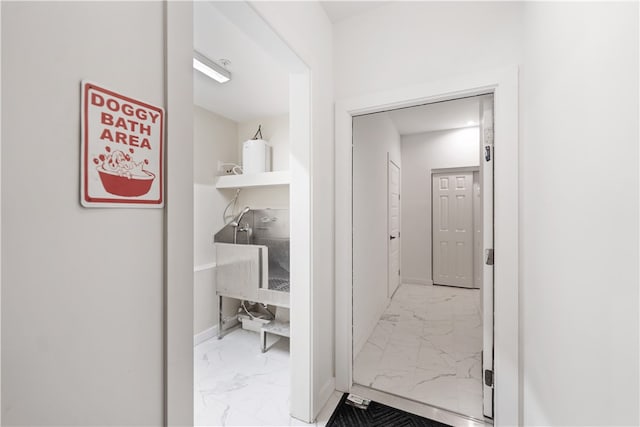 hallway with light tile floors