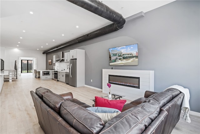 living room featuring light wood-type flooring