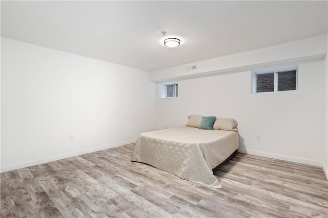 bedroom featuring light wood-type flooring