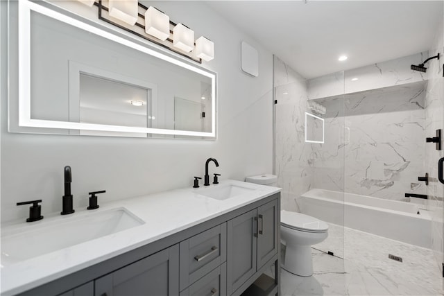 full bathroom featuring tiled shower / bath combo, double sink vanity, toilet, and tile floors