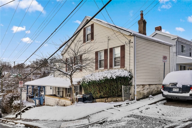 view of snow covered property