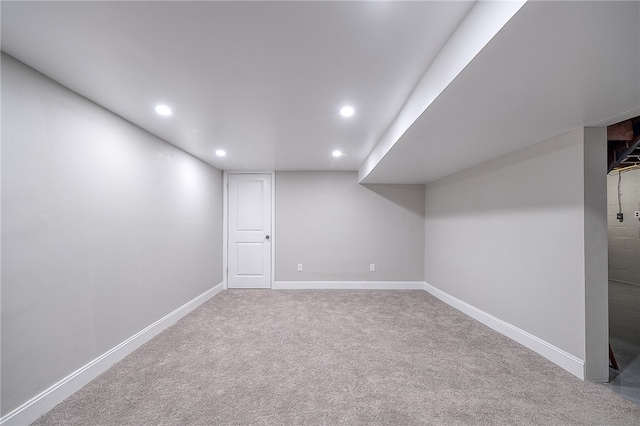 basement with light carpet