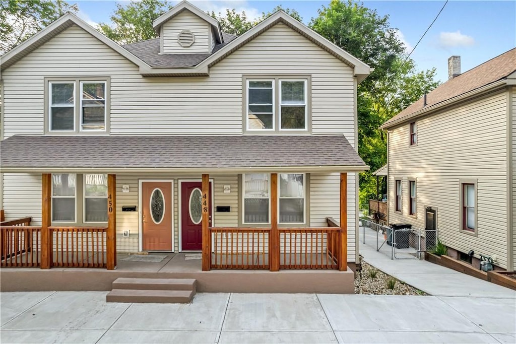 front of property featuring covered porch