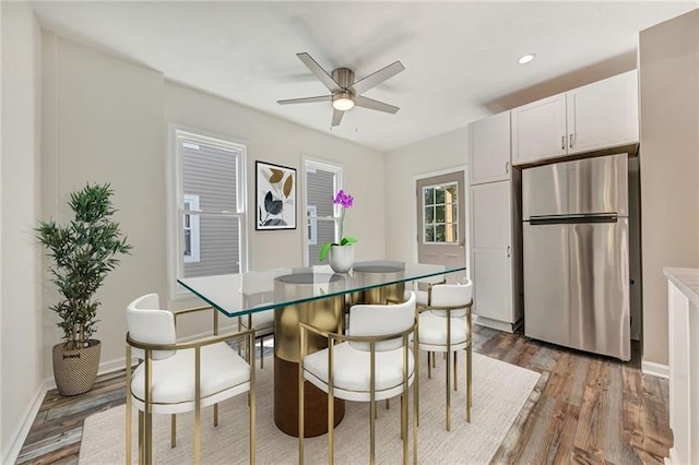 dining area featuring ceiling fan and light hardwood / wood-style flooring