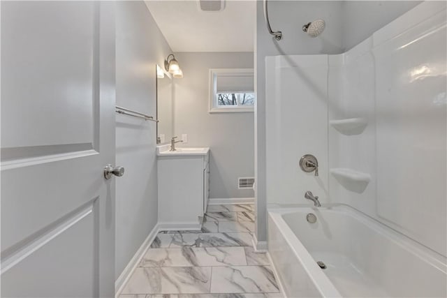 bathroom with vanity and shower / bathtub combination