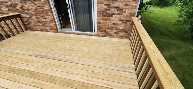 deck featuring a lawn