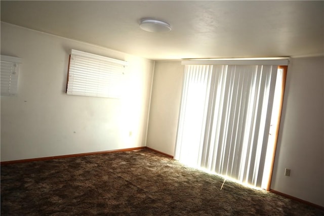 unfurnished room with carpet floors