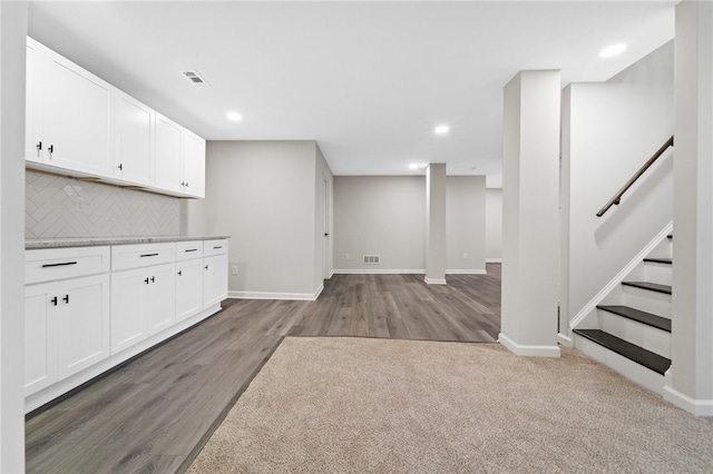 unfurnished living room with light hardwood / wood-style floors