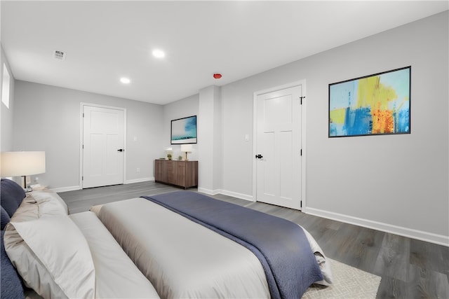 bedroom featuring dark wood-type flooring