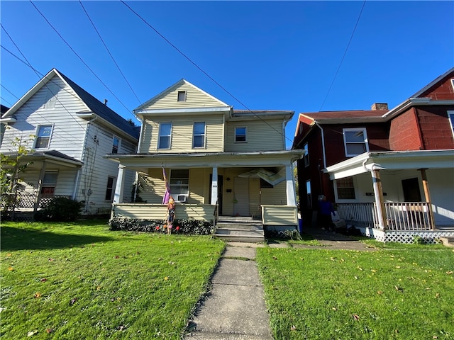 view of front facade with a porch and a front yard