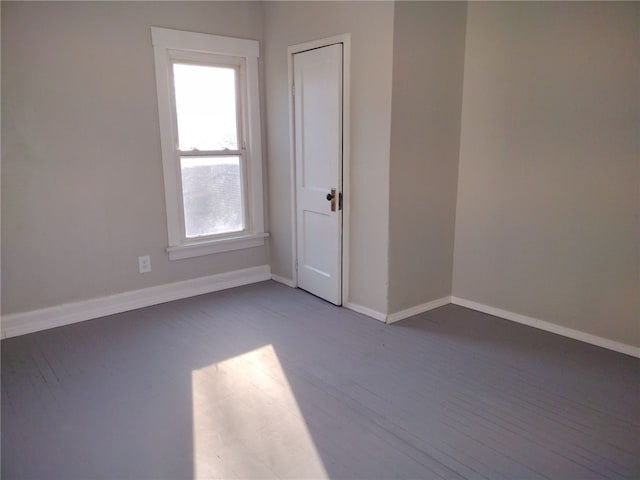 empty room featuring hardwood / wood-style floors