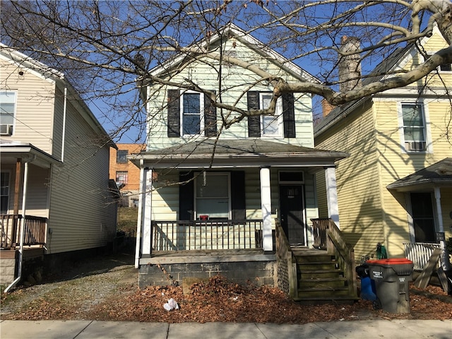 view of front property with covered porch