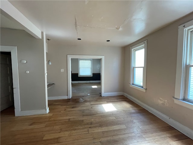 spare room featuring hardwood / wood-style flooring