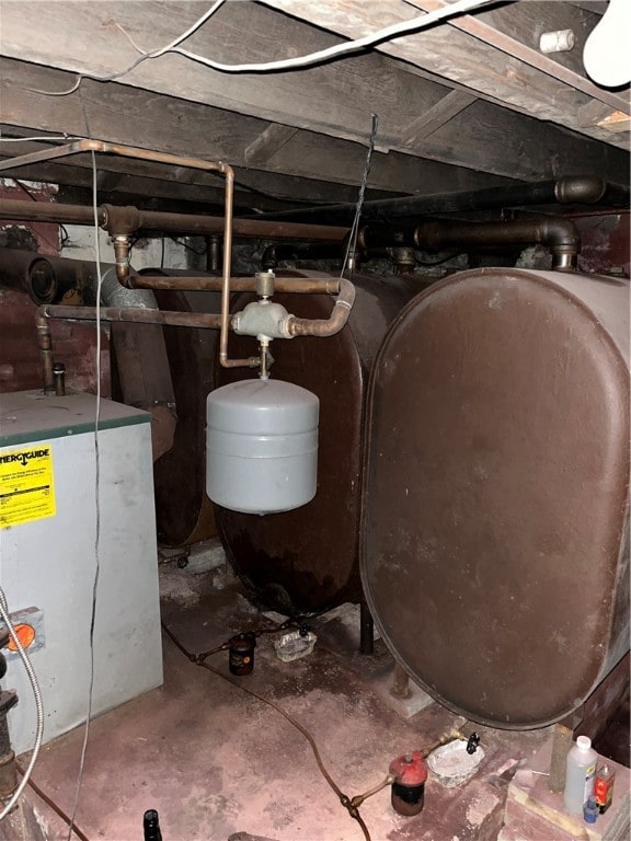 utility room featuring gas water heater