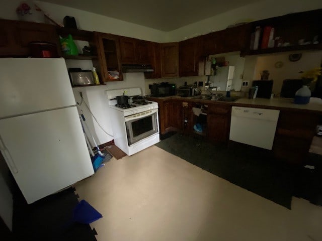 kitchen with white appliances and sink