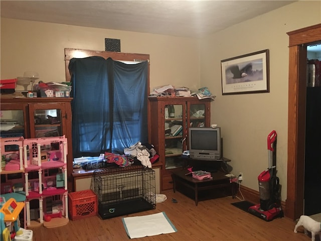 interior space with hardwood / wood-style flooring