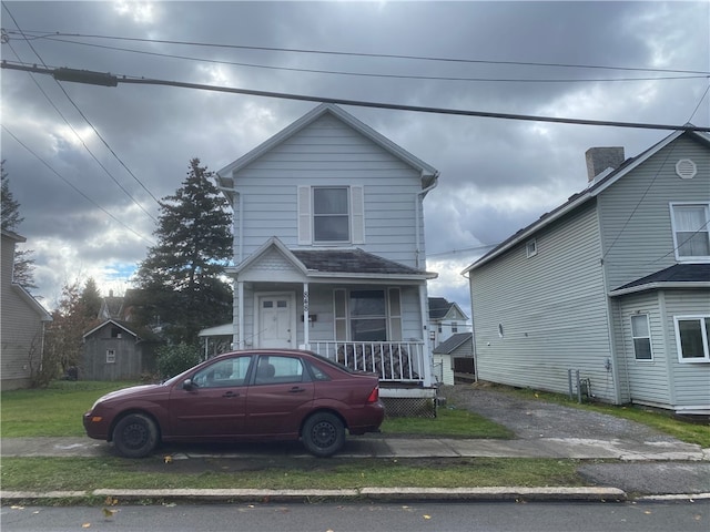 view of property with a porch