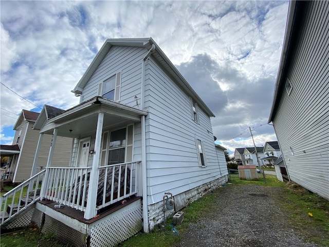 exterior space featuring covered porch