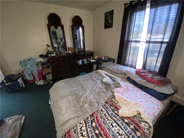 bedroom featuring carpet