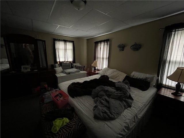 bedroom featuring a drop ceiling