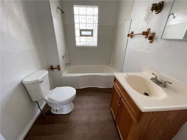 full bathroom featuring vanity, toilet, hardwood / wood-style flooring, and shower / bathtub combination