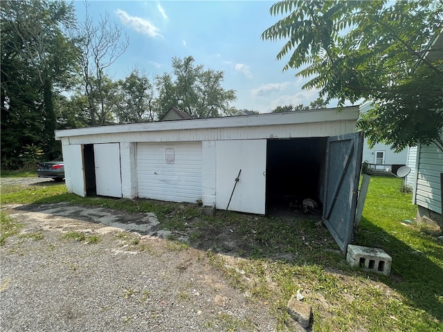 view of outbuilding with a garage