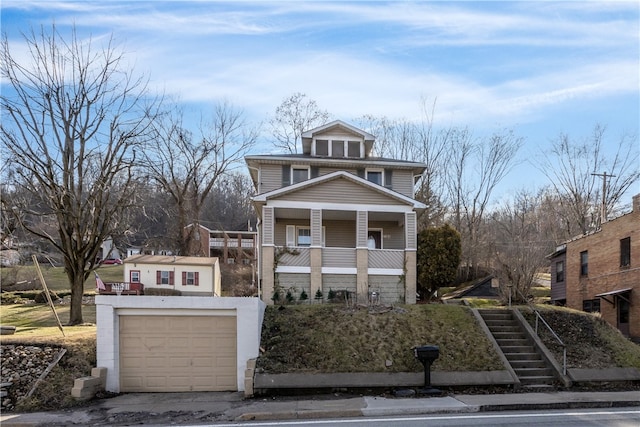 view of front of property with a garage