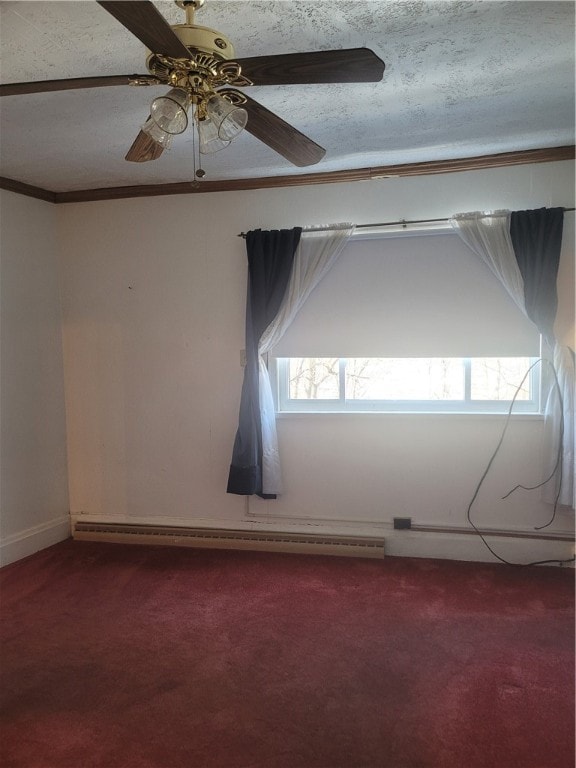 carpeted empty room featuring ceiling fan, a textured ceiling, and a baseboard heating unit