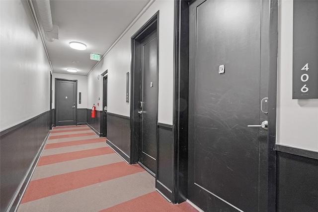 corridor featuring carpet floors