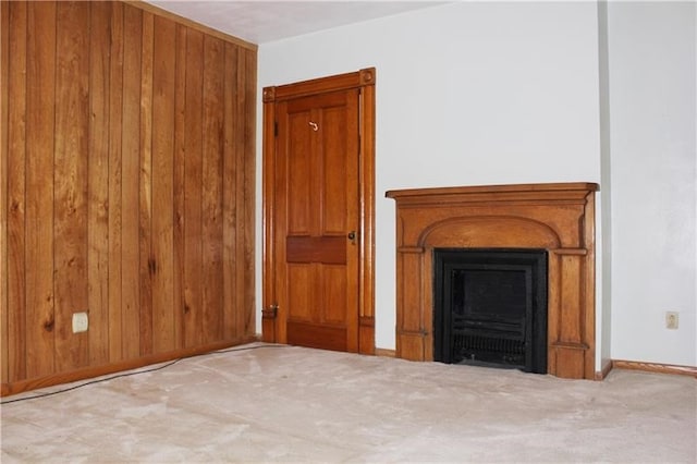 unfurnished living room with wooden walls