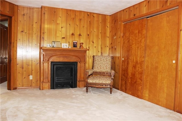 sitting room with wood walls