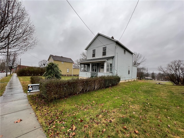 view of home's exterior featuring a yard